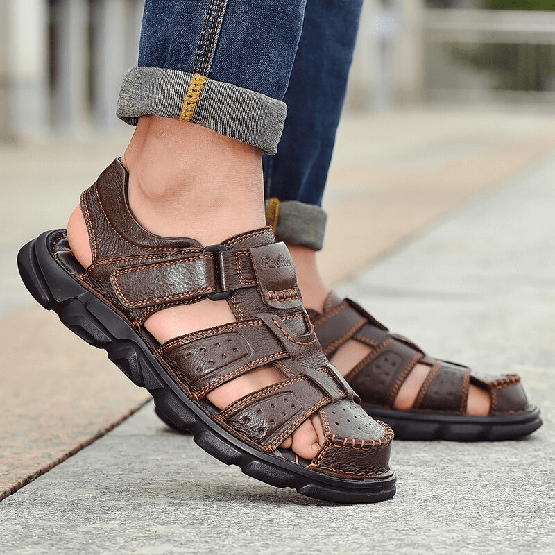 Soft Soles genuine leather trekking sandals with anti-collision toes for men, featuring hook & loop closure and rubber outsole.